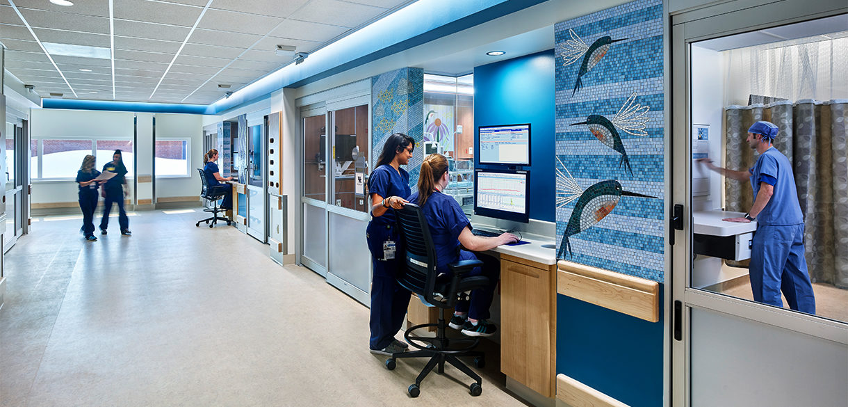 Two nurses at nursing station.