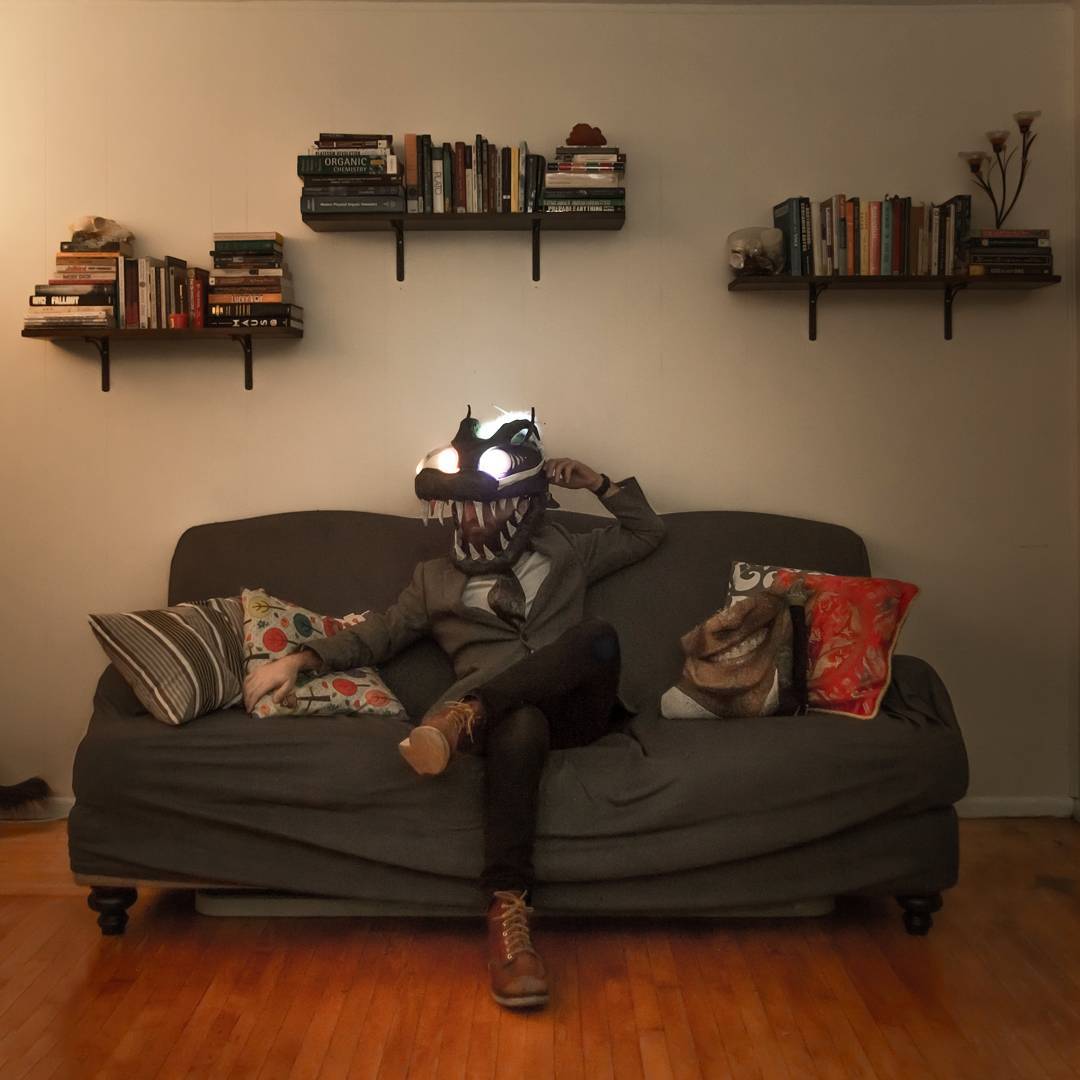 man sitting on couch